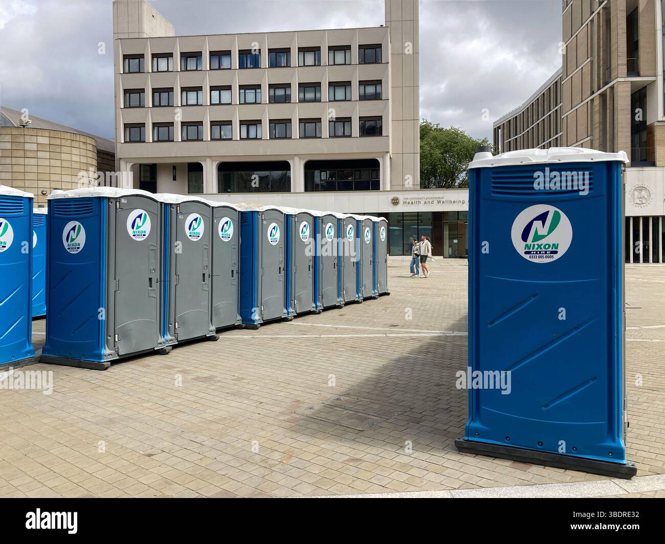 Chemical toilets lined in Bristo Square, Edinburgh Scotland - Smartphone Captured Stock Image