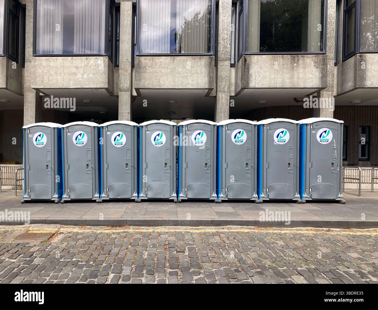 Chemical toilets lined in George Square, Edinburgh Scotland - Smartphone Captured Stock Image