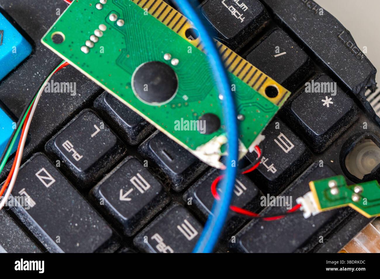 Computer keyboard. A broken, dirty, and dusty keyboard on a light background. High quality photo Stock Photo