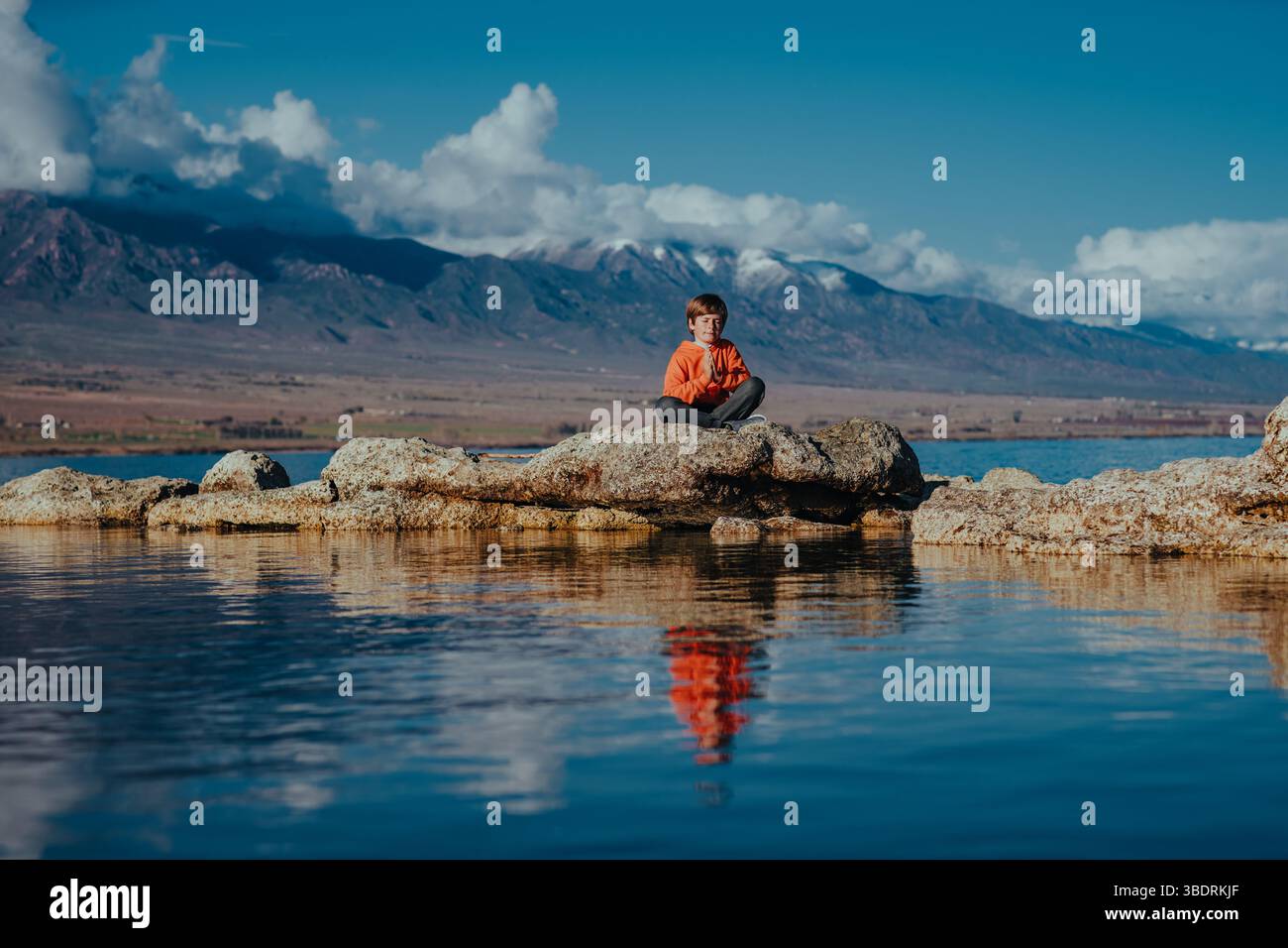 Calm caucasian boy sitting high hi-res stock photography and images - Alamy