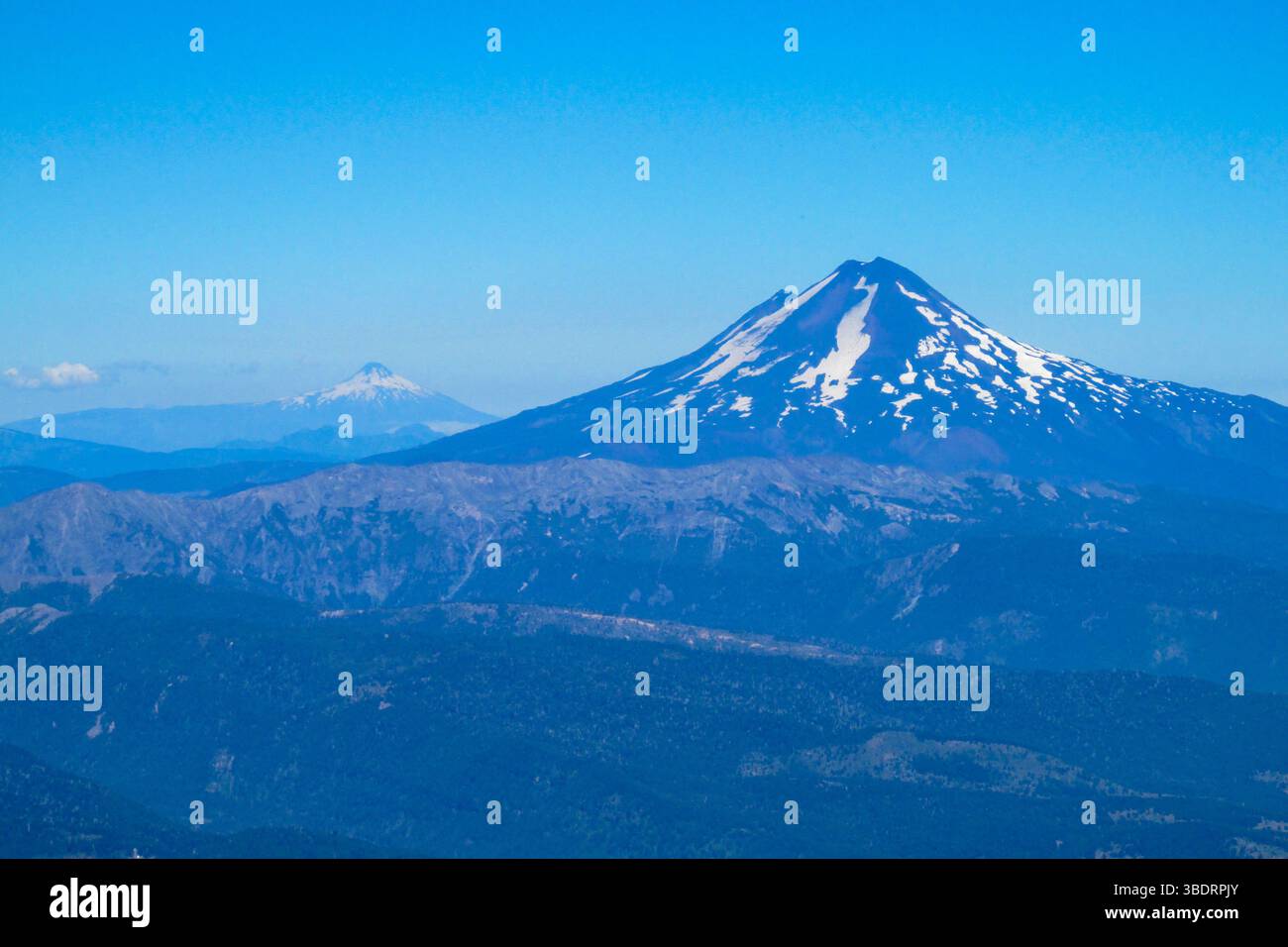 Volcanic landscape. Erupting volcano in South America in the Andes