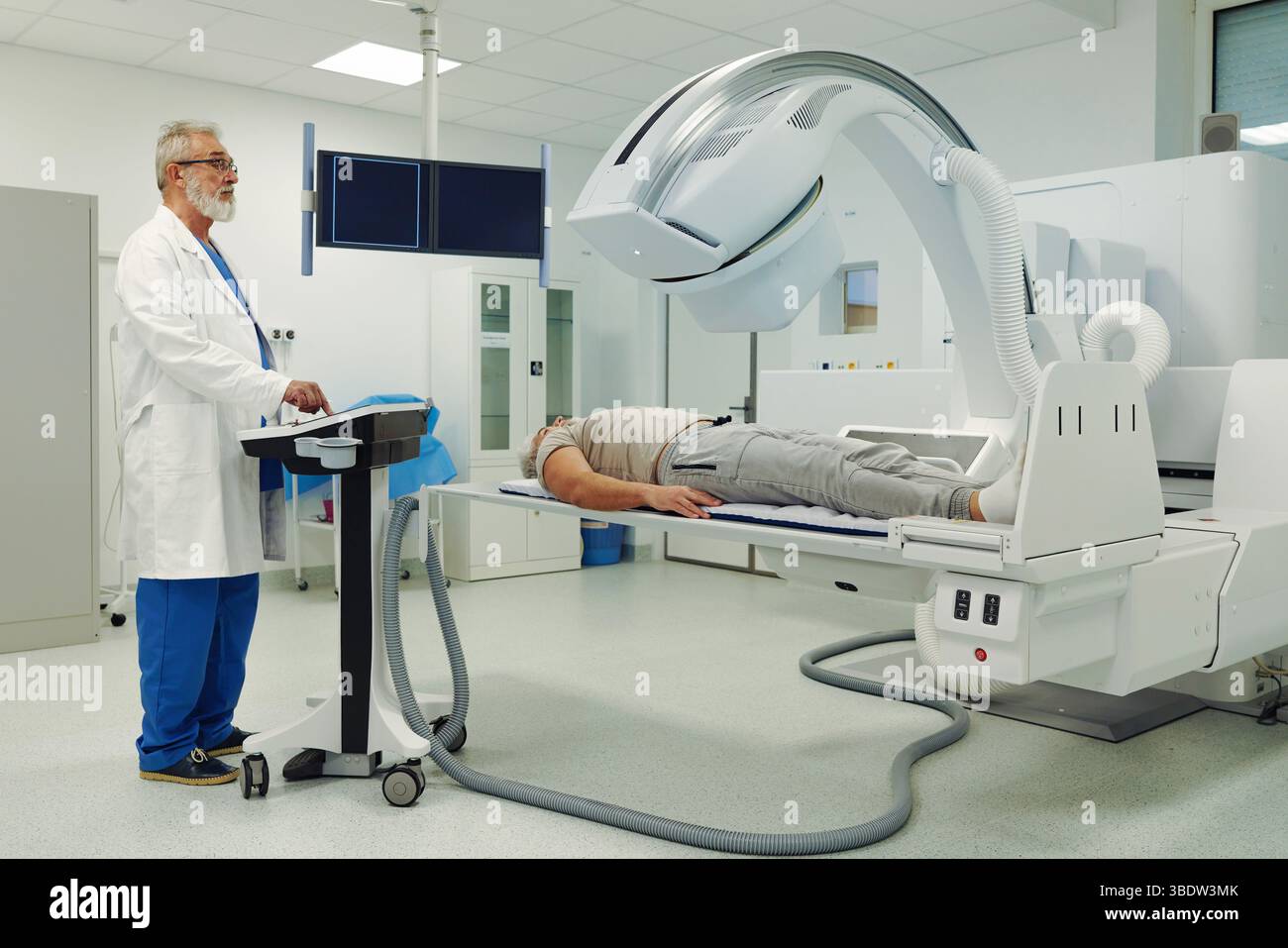 Male patient undergoing CT scan examination in hospital Stock Photo - Alamy