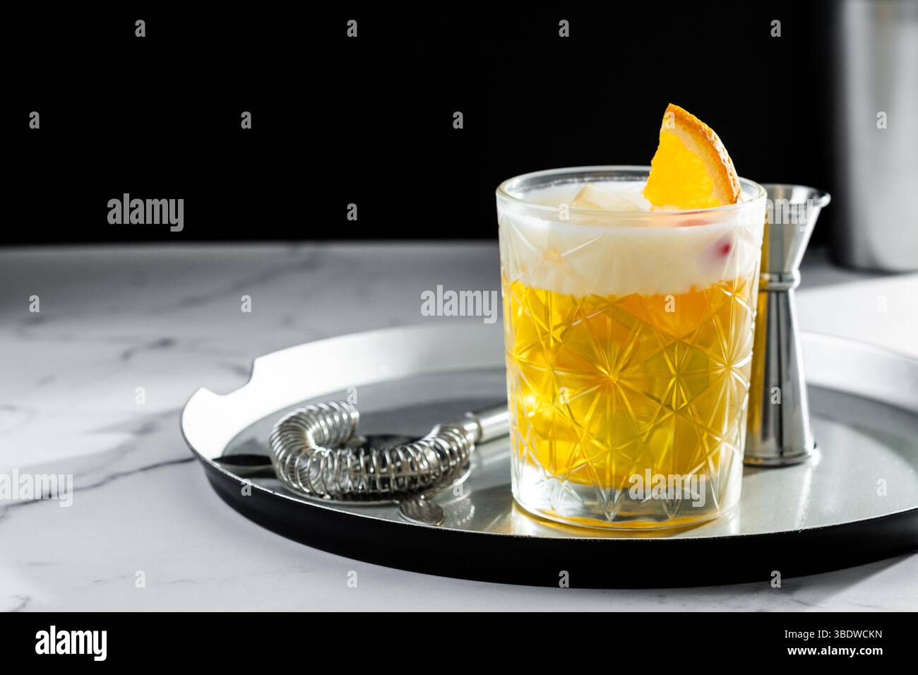 Classic cocktail whiskey sour on black background Stock Photo