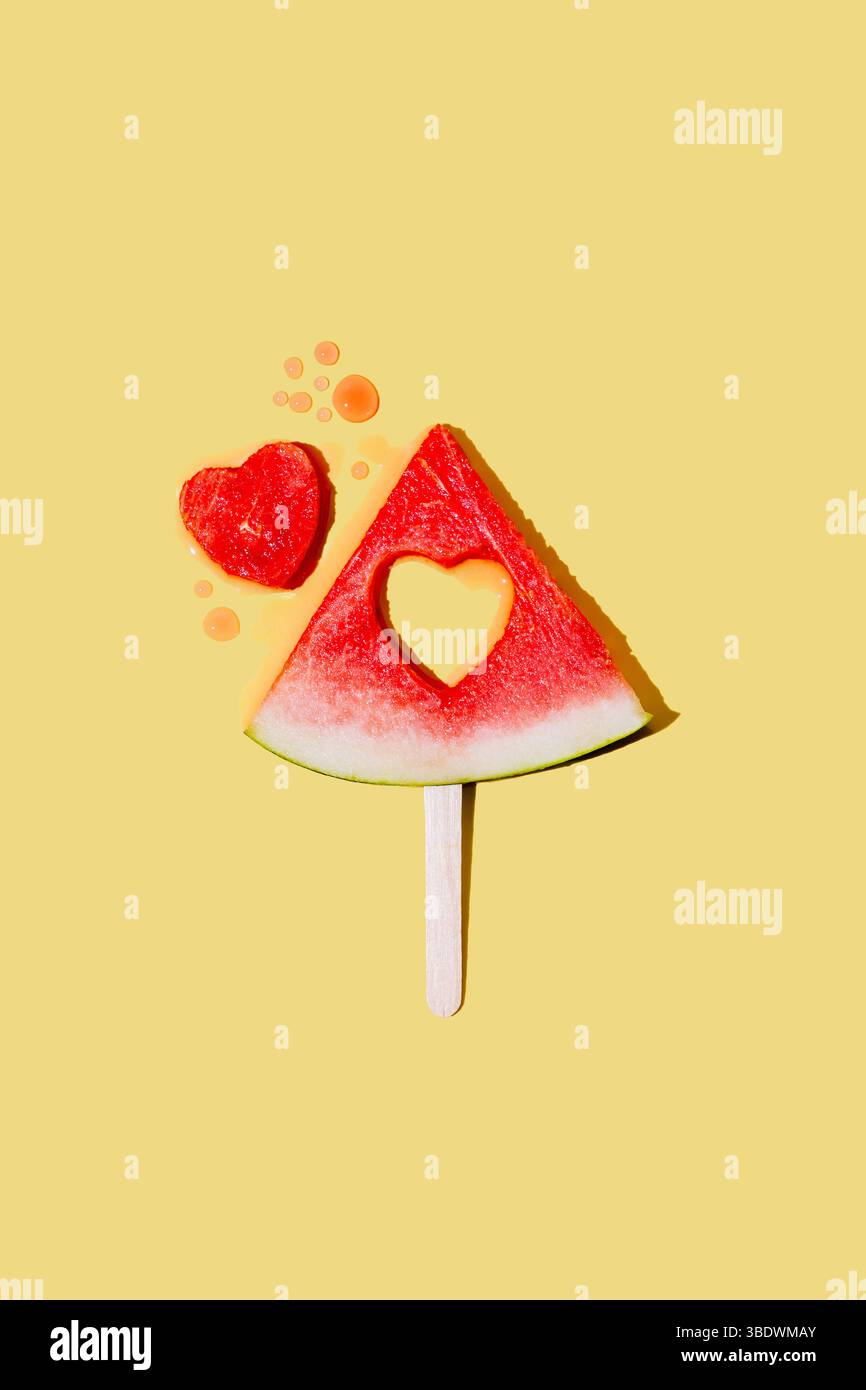 Abstract summer fruit background. Fresh watermelon slice on yellow Stock Photo