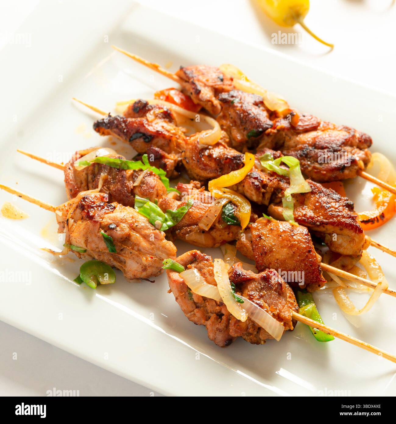 Shish Tawook – Chicken Thigh Cubes – Middle Eastern Food – Isolated on White Background Stock Photo