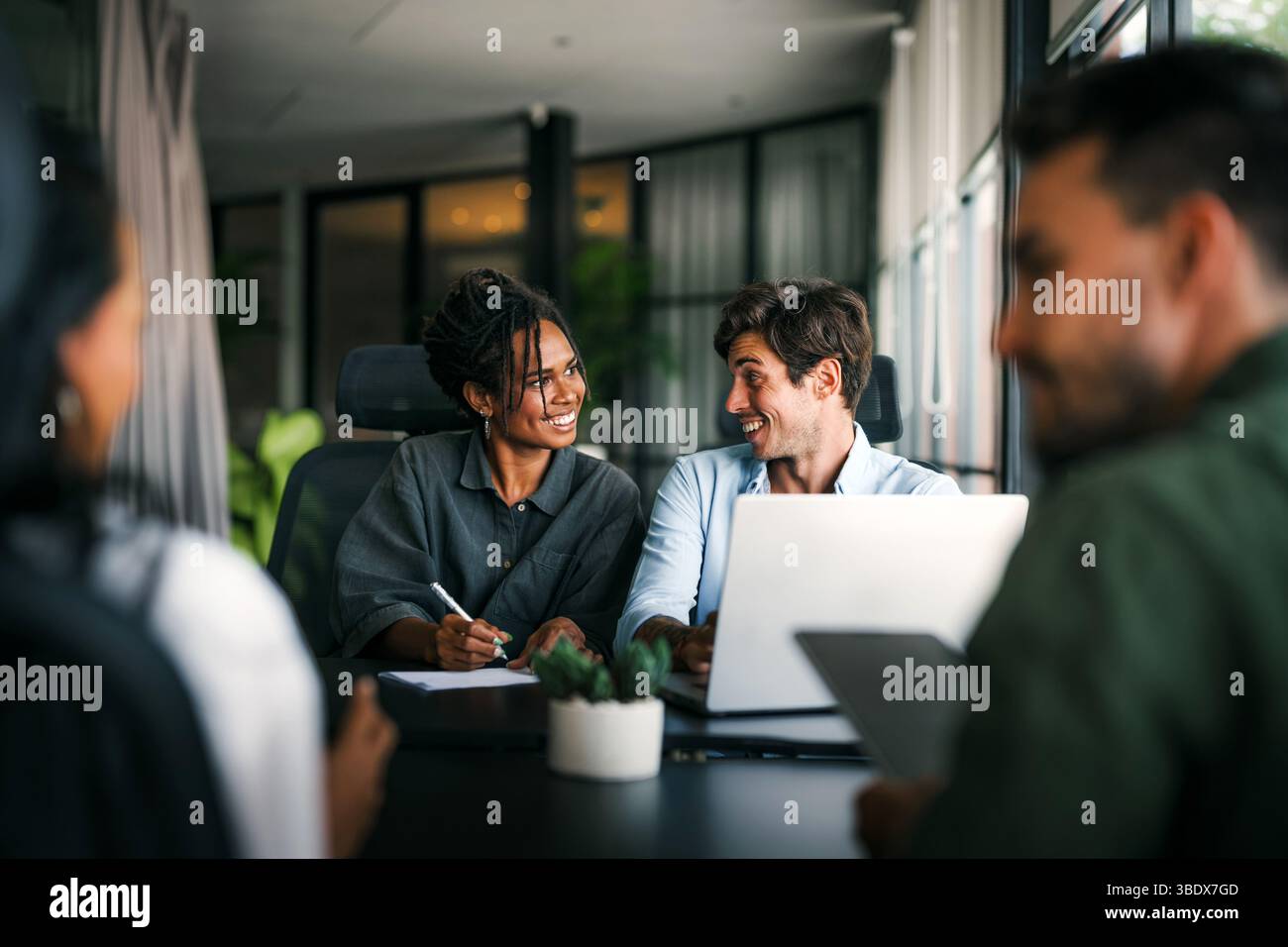 Team of industrial design agency specialists, software engineer programmers discussing in office Stock Photo