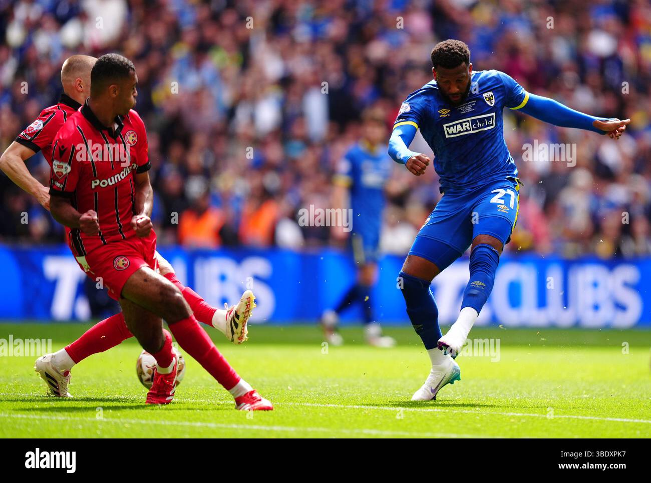 AFC Wimbledon s Myles Hippolyte right Attempts A Shot Towards Goal 