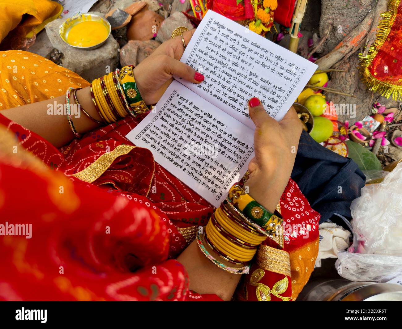 Married Hindu women perform rituals around a banyan tree on Vat Savitri ...
