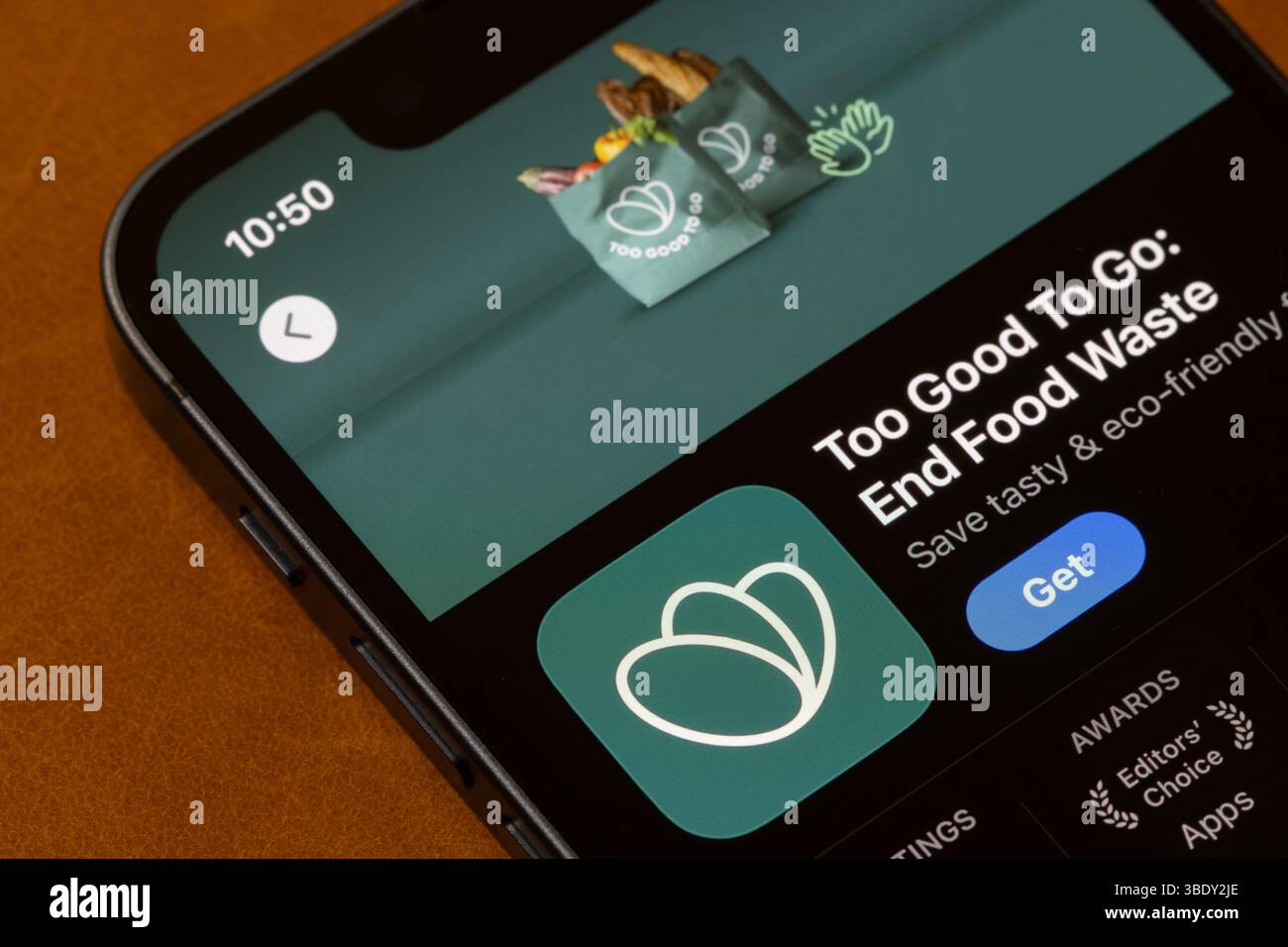 The Too Good To Go app, a free mobile application that connects customers with local businesses offering discounted or unsold food, in the App Store. Stock Photo