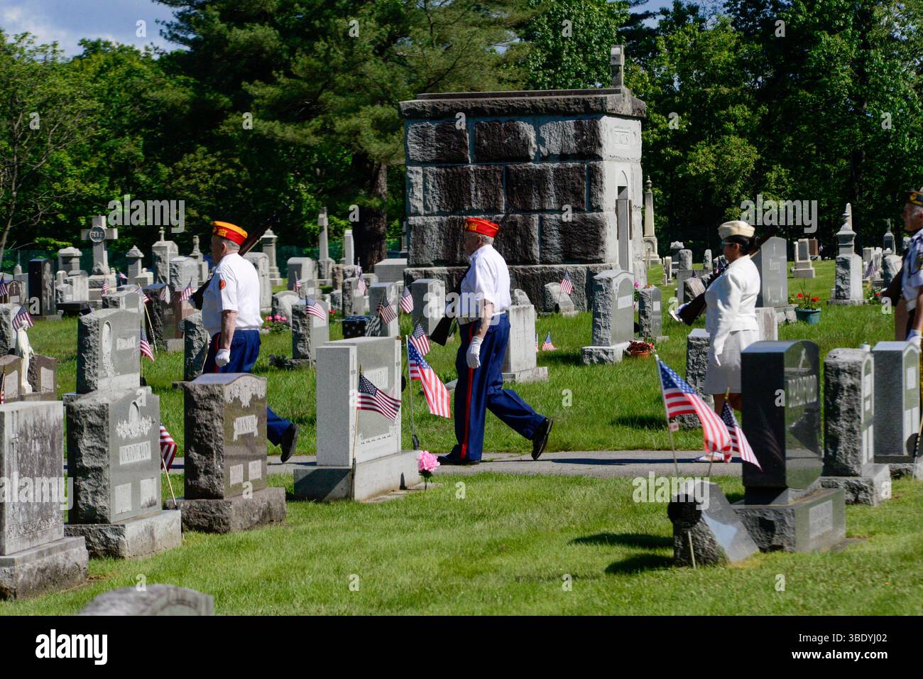 Members of the American Legion and the VFW visit memorials and