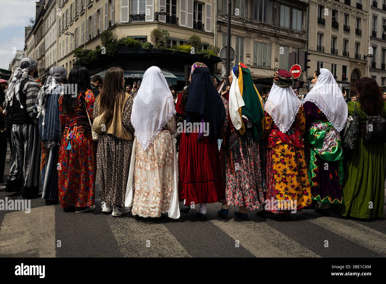 Kurdish people seen dressed in the traditional clothing during the Kurdish folk parade at the Paris Kurdish Cultural Festival. The Kurdish Democratic Council in France (CDK-F) organized the 4th edition of the Paris Kurdish Cultural Festival, in an event organized in collaboration with the Foundation Danielle Mitterrand, the Mairie de Paris, the Mairie du 10e arrondissement, the Mairie de Montreuil, the Association de Solidarité France-Kurdistan, the Institut de Réflexion et d'Études sur le Kurdistan (IREK) and the Arts and Culture du Kurdistan (ACK) association. The festival began with a Kurdi Stock Photo