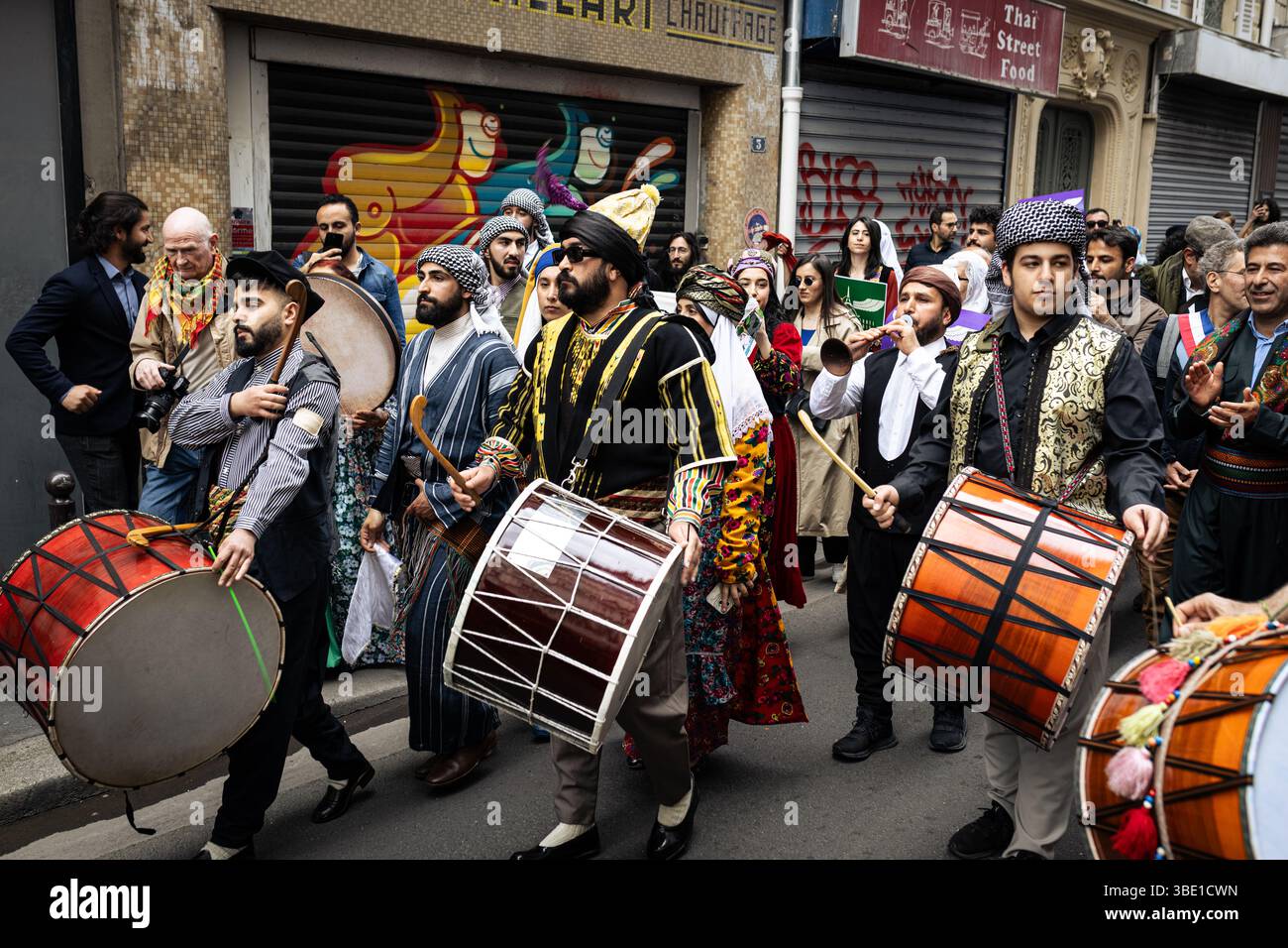 Kurdish musicians are seen playing drums during the kurdish folk parade at the Paris Kurdish Cultural Festival. The Kurdish Democratic Council in France (CDK-F) organized the 4th edition of the Paris Kurdish Cultural Festival, in an event organized in collaboration with the Foundation Danielle Mitterrand, the Mairie de Paris, the Mairie du 10e arrondissement, the Mairie de Montreuil, the Association de Solidarité France-Kurdistan, the Institut de Réflexion et d'Études sur le Kurdistan (IREK) and the Arts and Culture du Kurdistan (ACK) association. The festival began with a Kurdish folk parade, Stock Photo