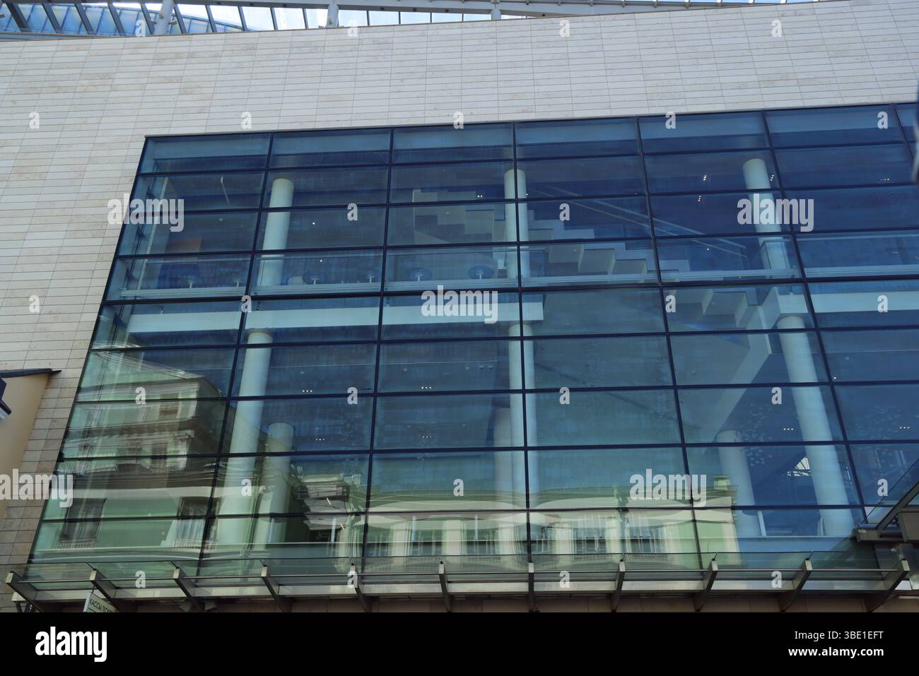 A Contemporary Reflection on the Facade of a Modern Glass Building and ...