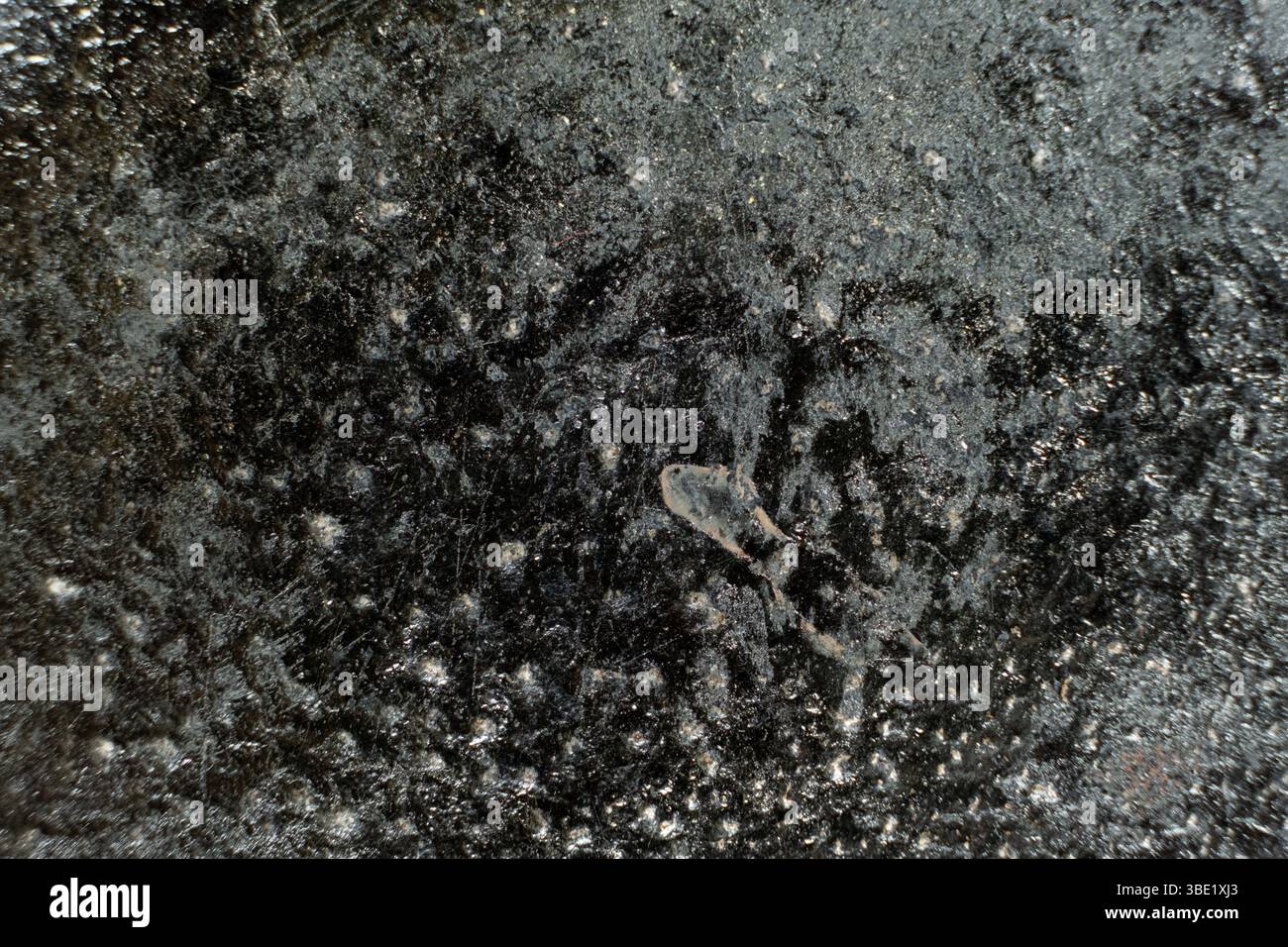 Rust stains on cast iron surface, macro Stock Photo