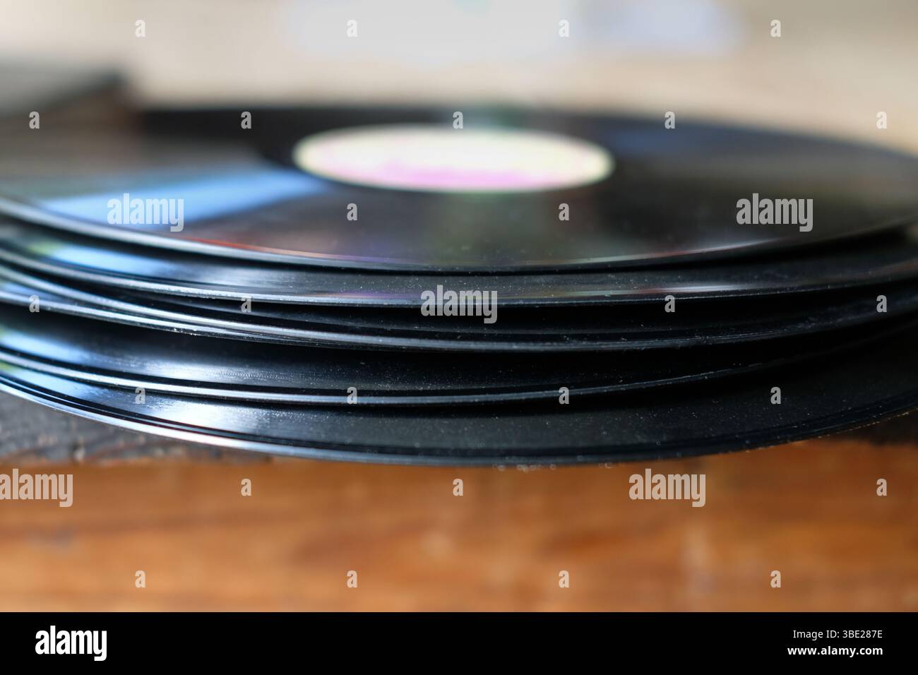A pile of warped records Stock Photo