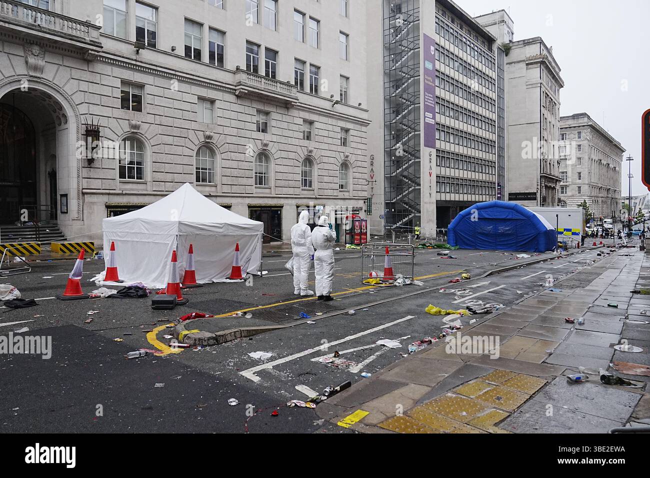 Forensic officers at the scene in Water Street near the Liver Building ...
