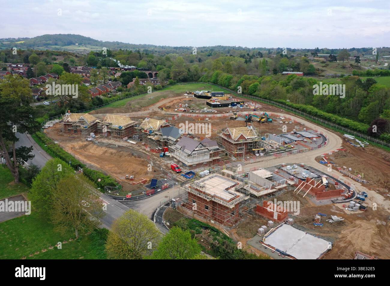 New build housing estate under construction on edge of Bewdley, Worcestershire, Severn Valley Railway and West Midland Safari Park in background, Stock Photo
