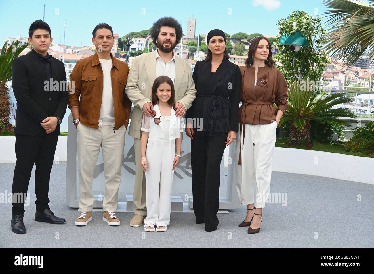 Cast and crew of the film: Sinan Mohebi, Payman Maadi, Arshida Dorostkar, Parinaz Izadyar, Soha Niasti Photocall of the film 'Mother and Child' ('Zan O Bacheh') 78th Cannes Film Festival 23 May 2025 Stock Photo