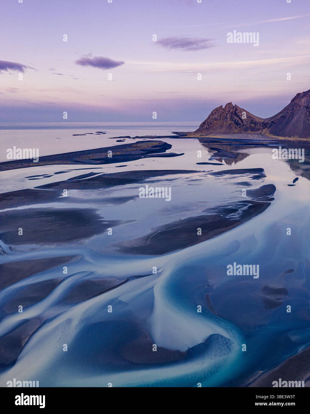 Aerial view of Brunnhorn mountain and braided river delta in East Iceland. Stock Photo