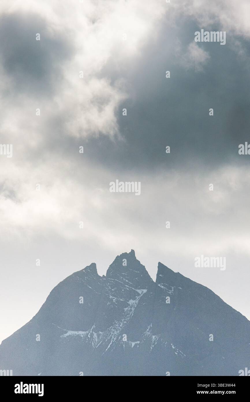 Brunnhorn mountain peak under dramatic skies in East Iceland. Stock Photo