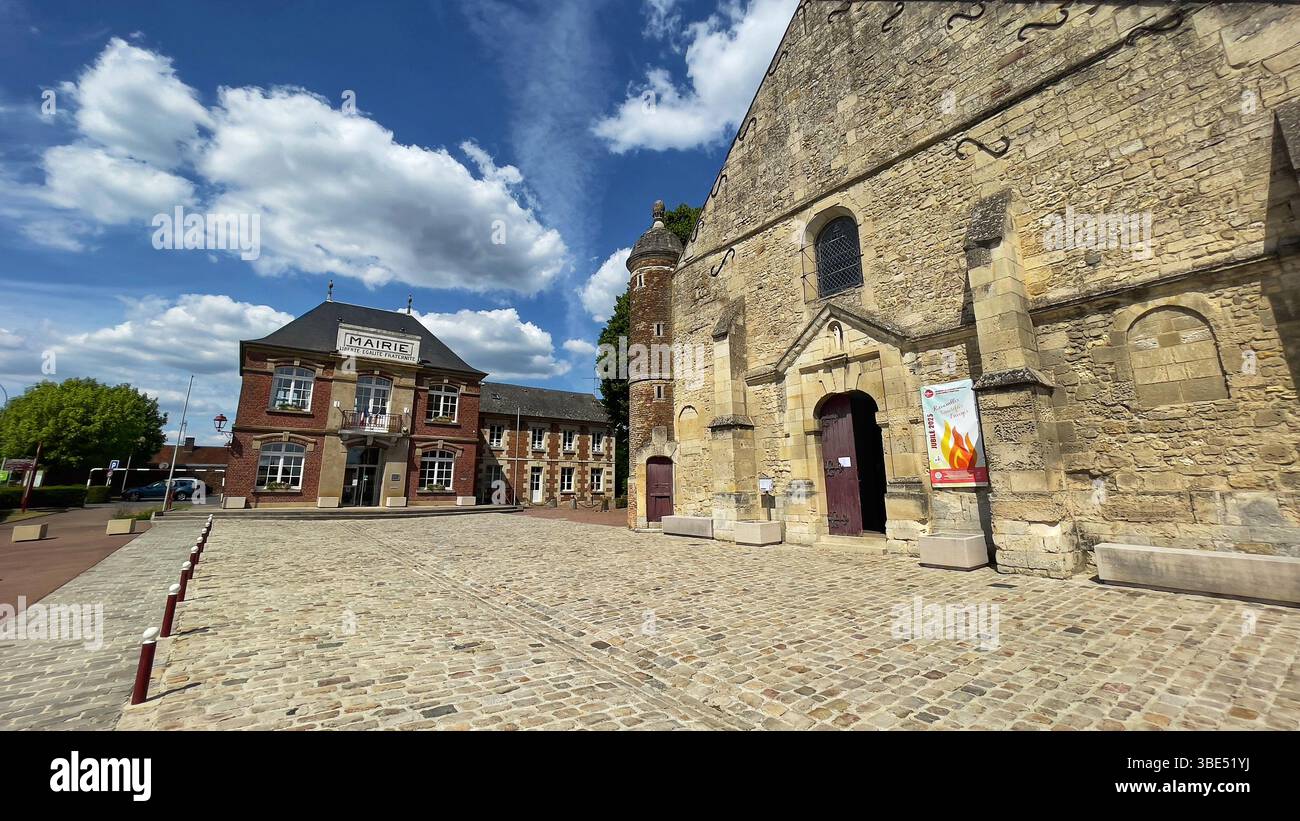 The church and town hall in Chevrières, France, stand side by side ...