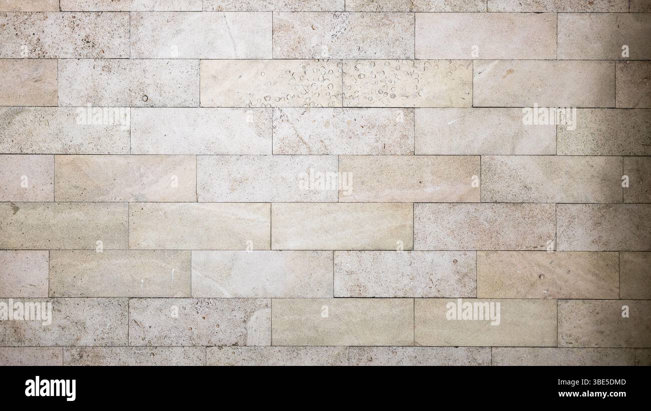 panoramic background - wall tiled with shell rock boards Stock Photo