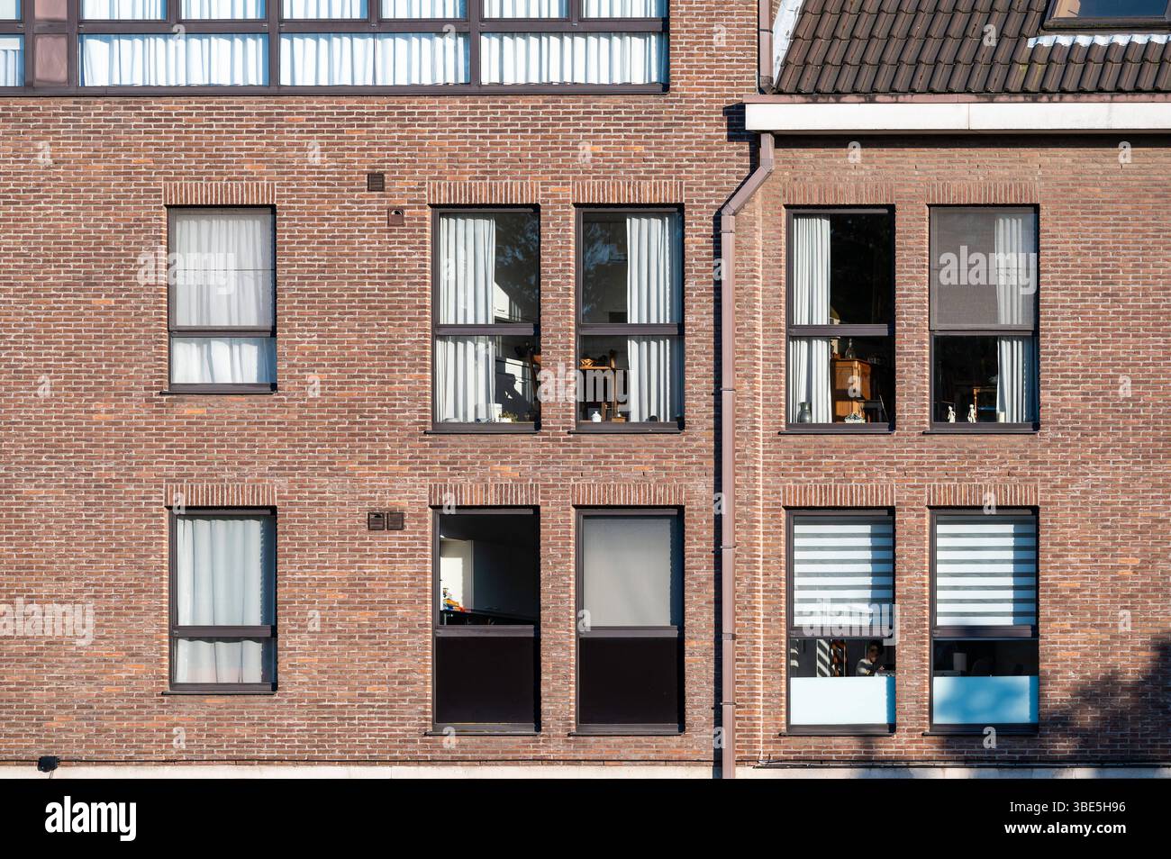 Brick Stone Apartment Blocks At The Hendrik Heyman Square In The City brick-stone-apartment-blocks-at-the-hendrik-heyman-square-in-the-city