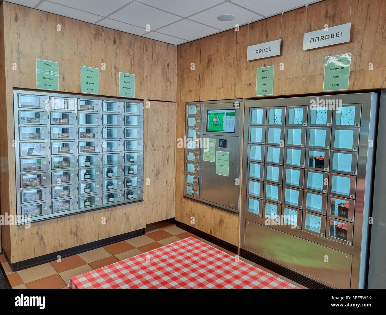 Unmanned shop with only vending machines 'De Aurtomatenshop', selling fresh local food, fruits, meat, etc. in Eindhoven, The Netherlands - Smartphone Captured Stock Image