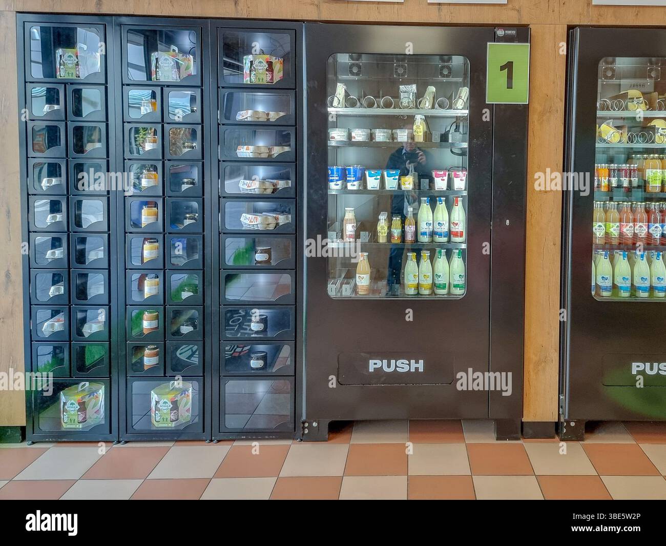 Unmanned shop with only vending machines 'De Aurtomatenshop', selling fresh local food, dairy, meat, eggs, jams, etc. in Eindhoven, The Netherlands - Smartphone Captured Stock Image