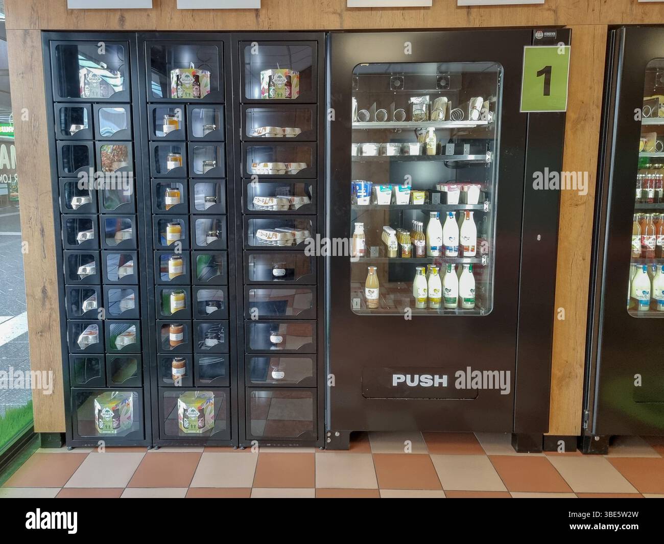Unmanned shop with only vending machines 'De Aurtomatenshop', selling fresh local food, dairy, meat, eggs, jams, etc. in Eindhoven, The Netherlands - Smartphone Captured Stock Image