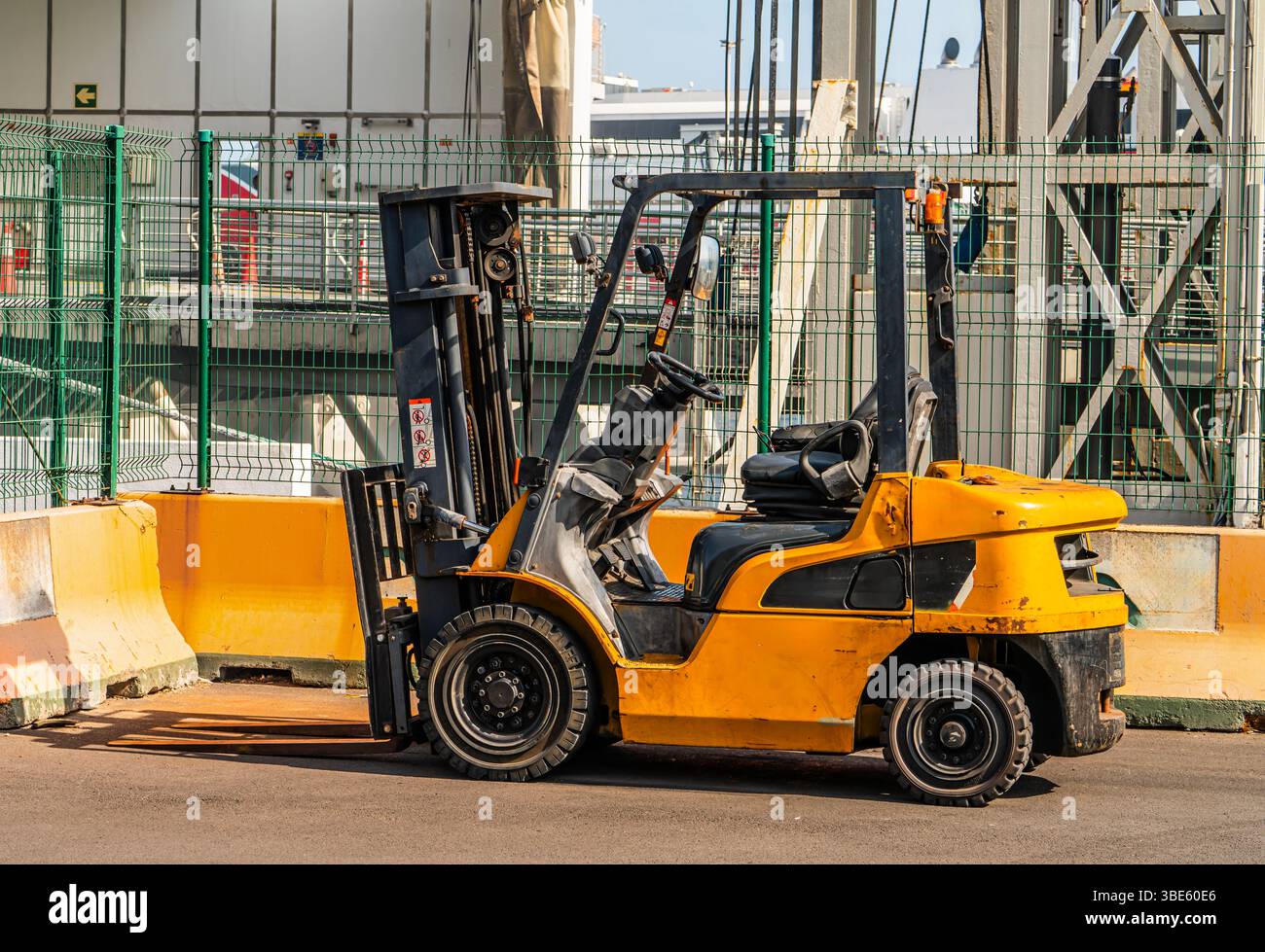 Yellow Industrial Forklift Truck Parked at Loading Area Stock Photo - Alamy
