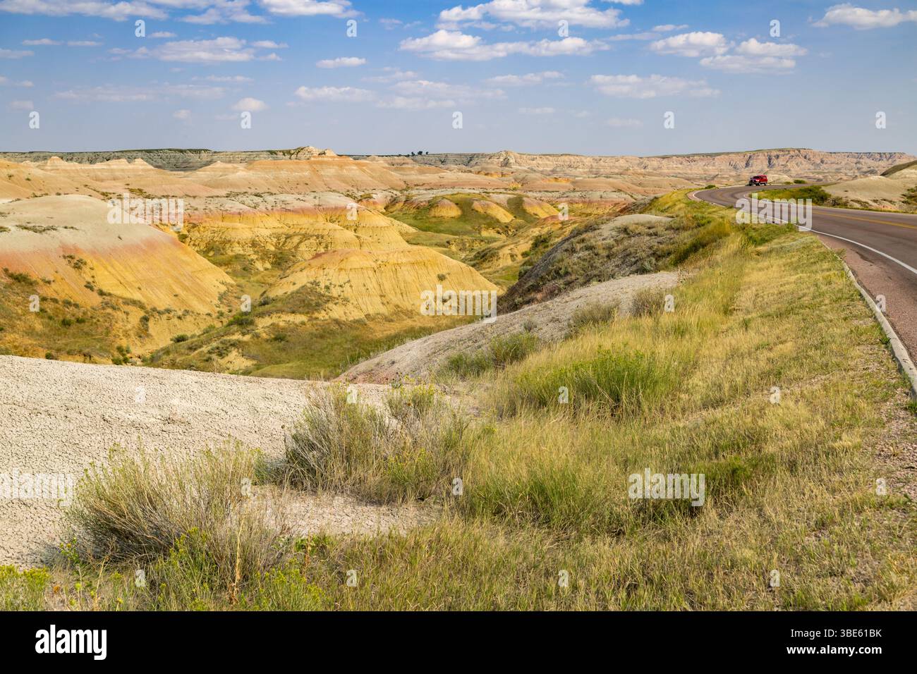Erosion exposes colorful layers of sedimentary rock in the Badlands ...