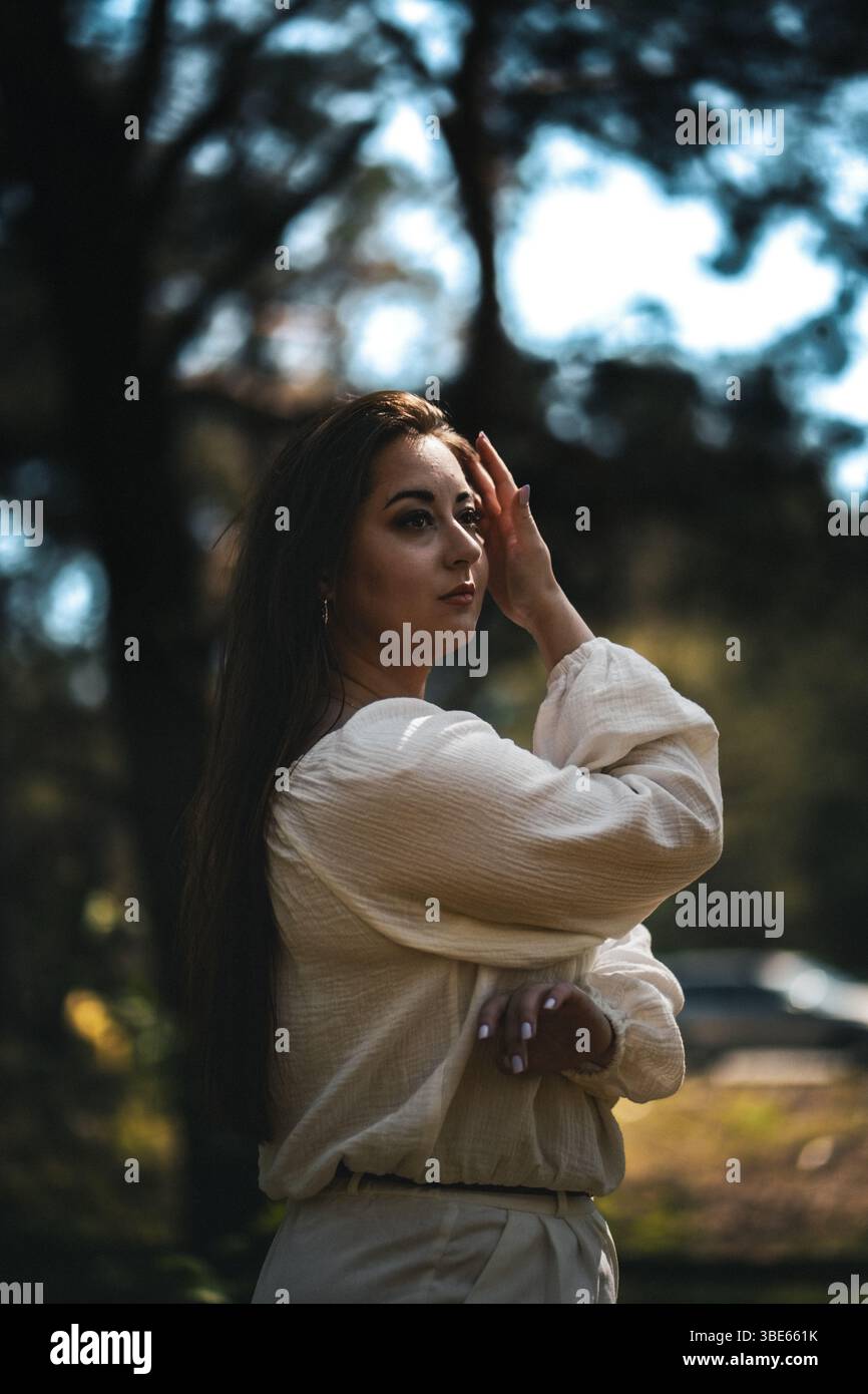 Woman posing in the forest Stock Photo - Alamy