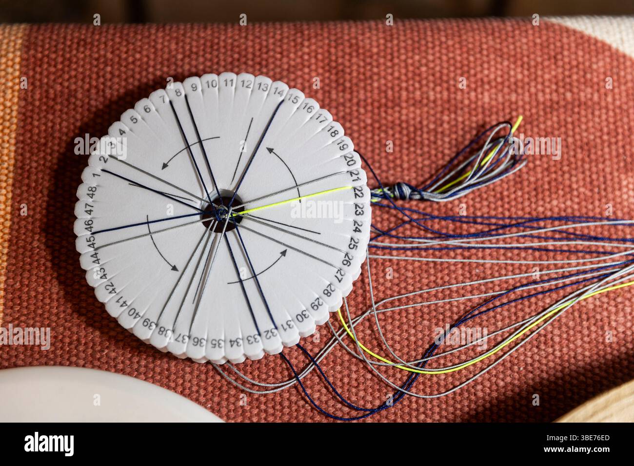 Kumihimo Braiding Disk with Colorful Threads for Crafting Stock Photo