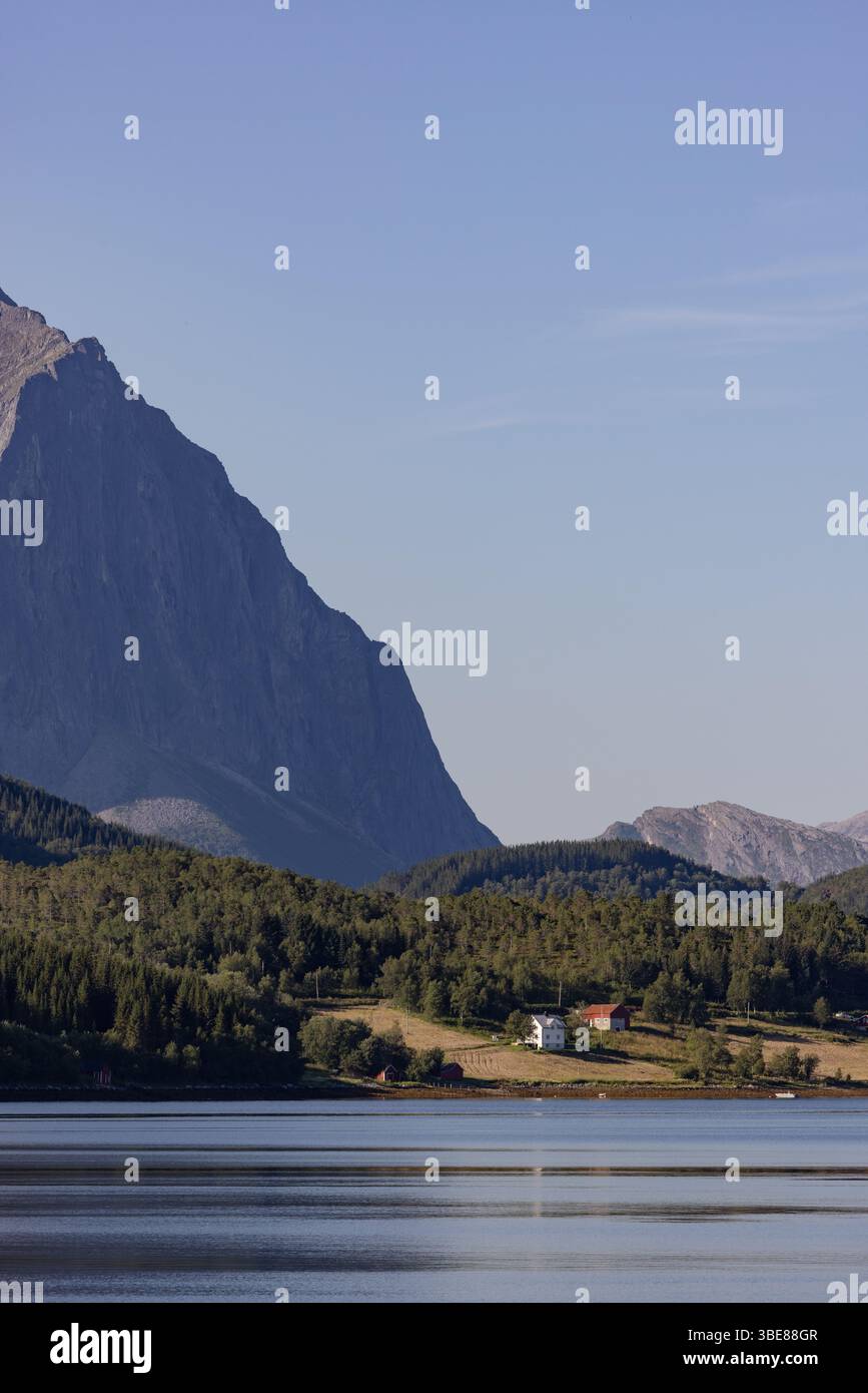 Picture of Vertical view of traditional Norwegian homes by the fjord beneath a ...