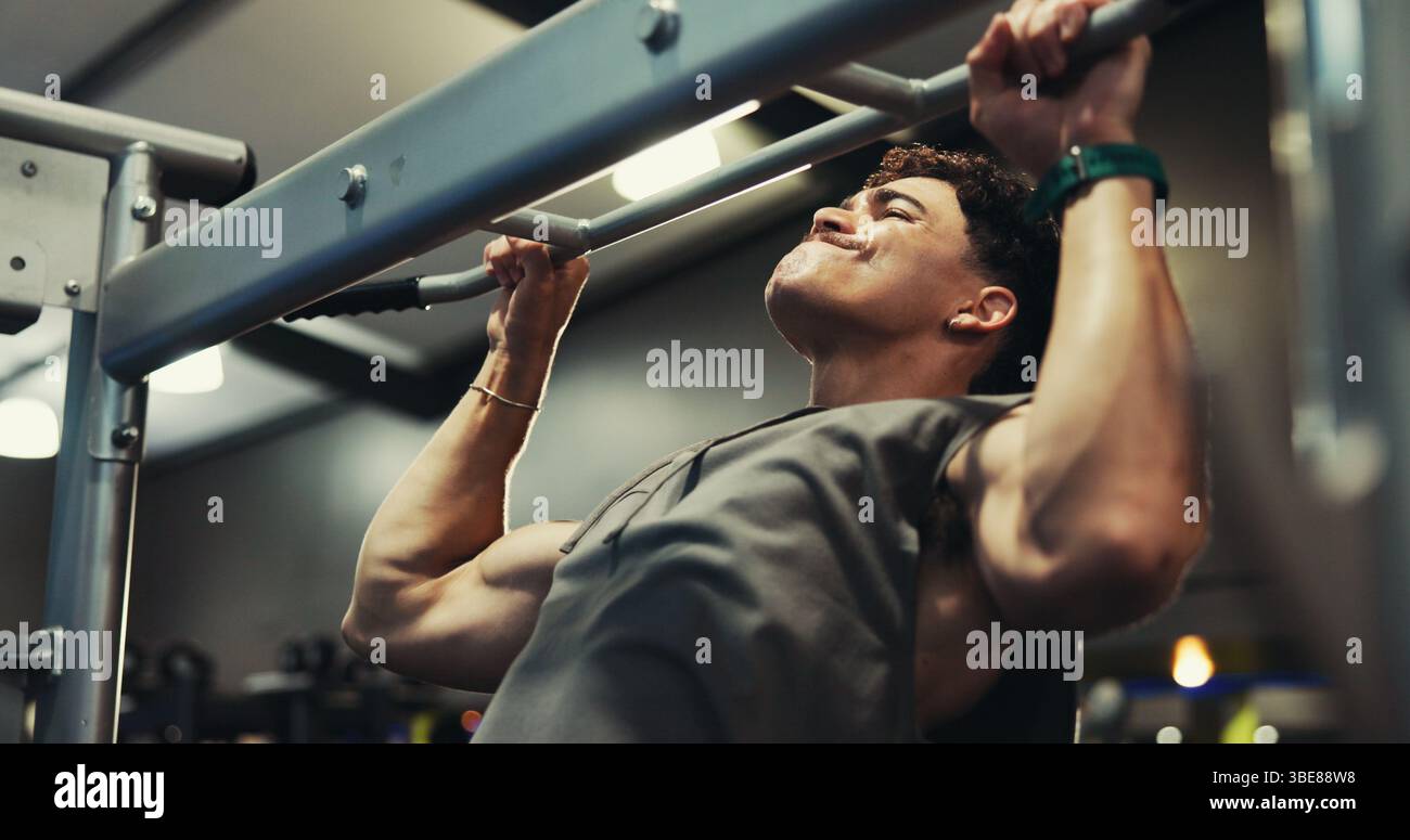 Fitness, man and exercise on pull up bar at gym for shoulder muscle ...