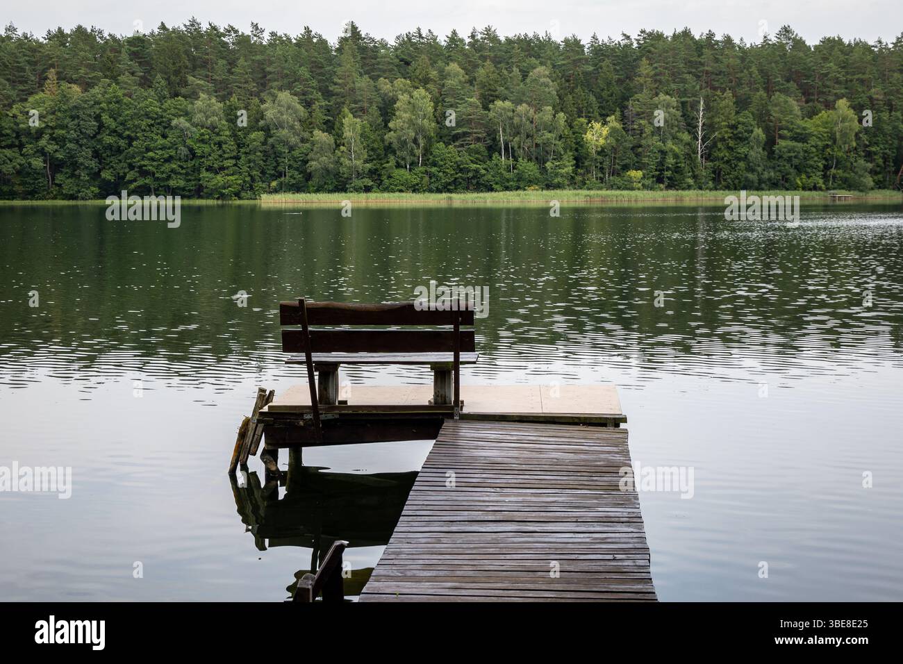 Wooden pier on Lake Aviris near Leipalingis town, Druskininkai Municipality, Alytus County of Lithuania Stock Photo