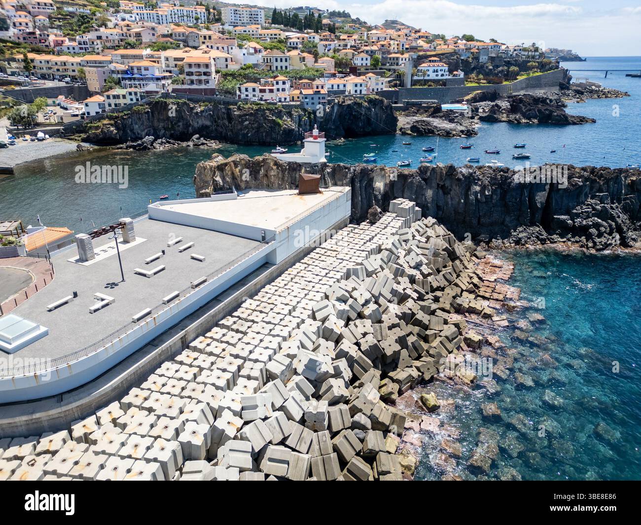 Concrete breakwater in Camara de Lobos on Madeira Island, Portugal Stock Photo