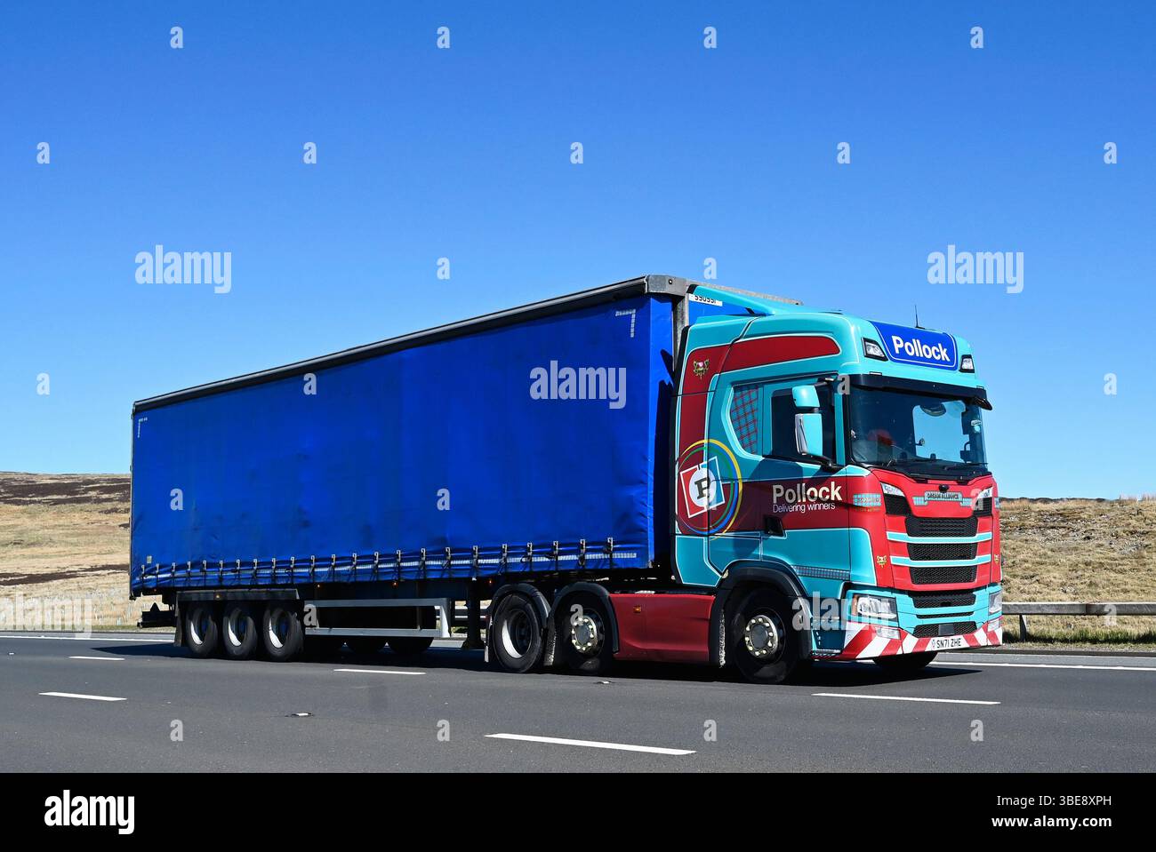 Pollock (Scotrans) Limited HGV, travelling at speed on the M6 Motorway Southbound carriageway, Shap, Cumbria, England, United Kingdom, Europe. Stock Photo