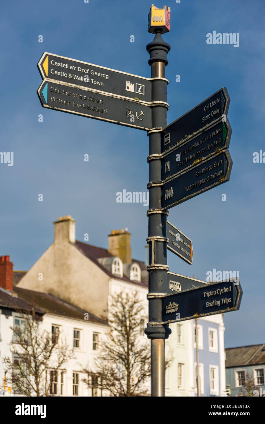Welsh Signpost Signpost for castle, Victoria Dock, toilets, etc, Caernarfon, Gwynedd ...