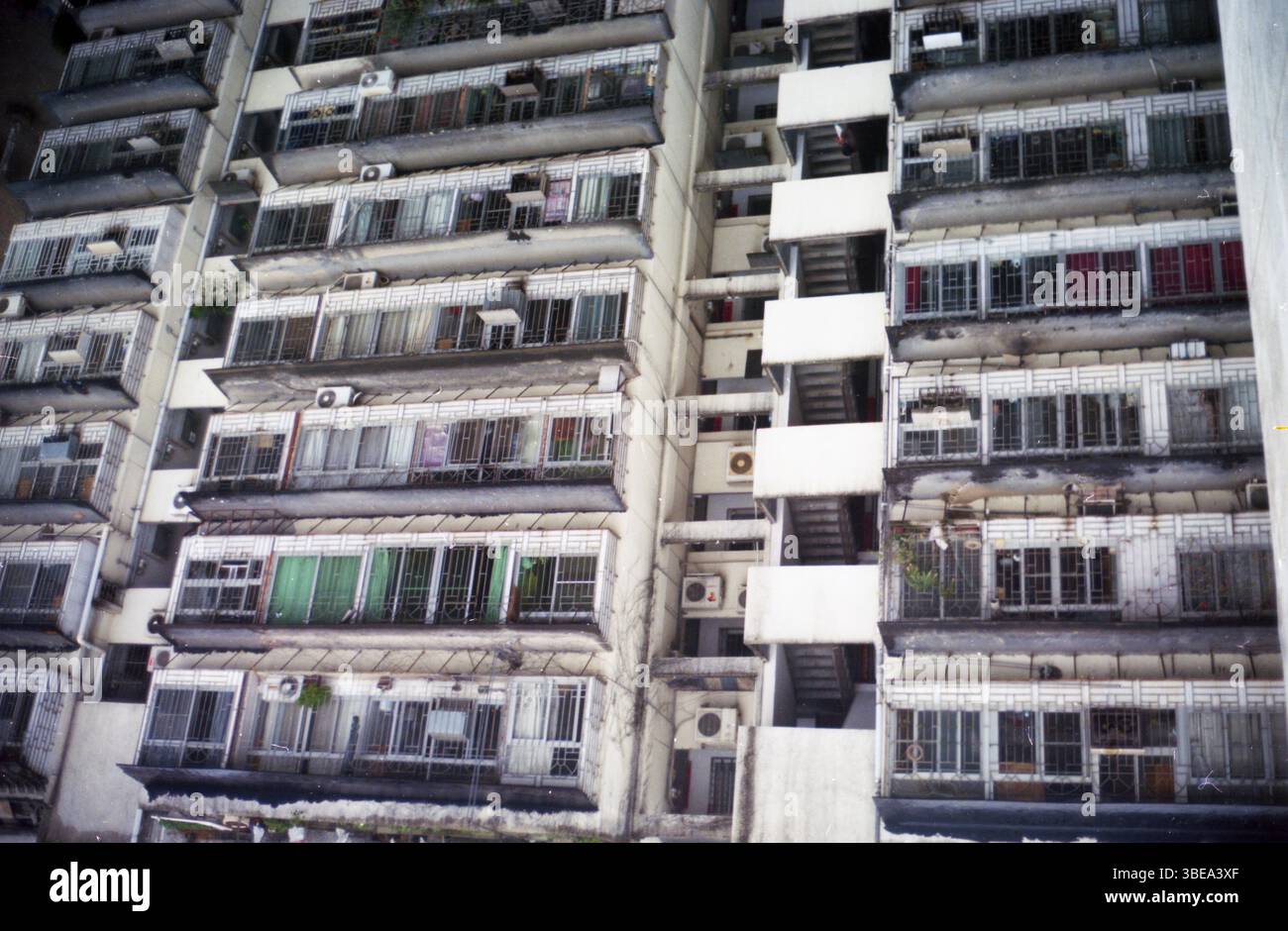 Early 2010s Xiamen Residential Building Facade with Balconies and Stairwell, China Stock Photo
