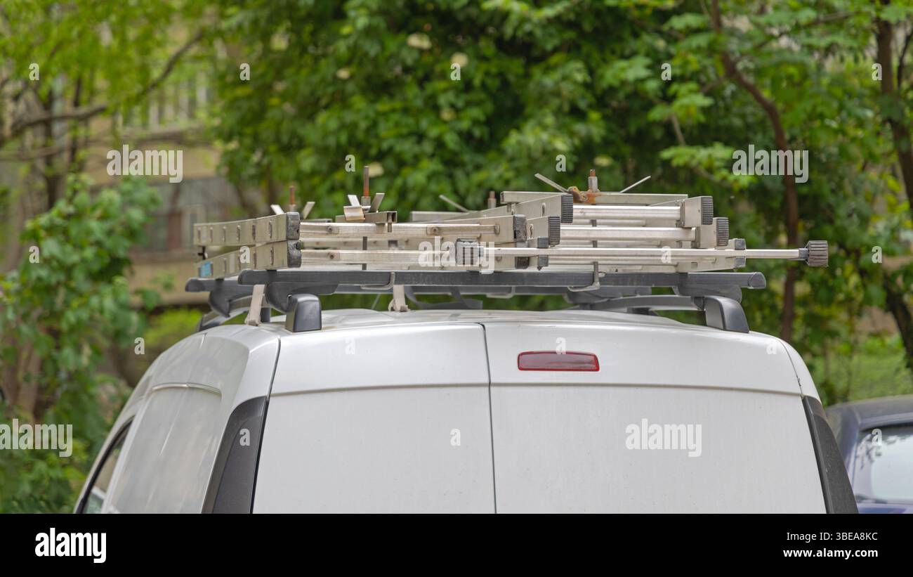 Two Ladders Roof Rack at Top of Service Vehicle Van Rear View Stock ...