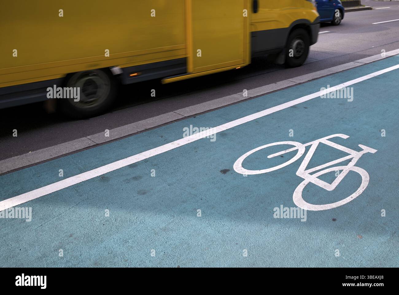 Car, Postbus, DHL, delivery vehicle, next to cycle path, pictogram, logo, labelling, road, motion effect, speed, Stuttgart, Baden-Wuerttemberg, German Stock Photo