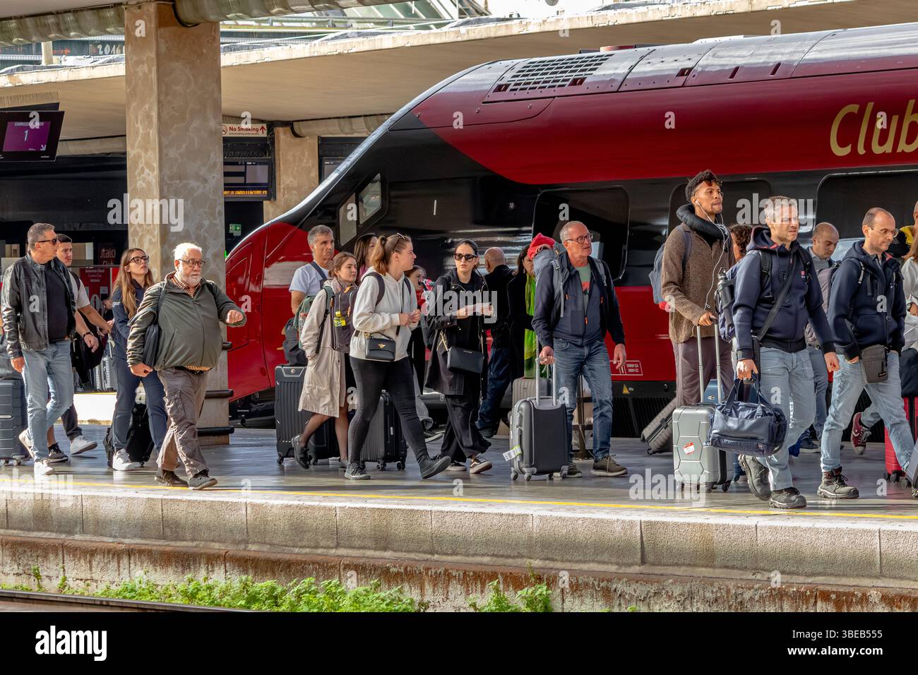 Rail passengers on the platform at Santa Maria Novella Station in Florence,Italy Stock Photo