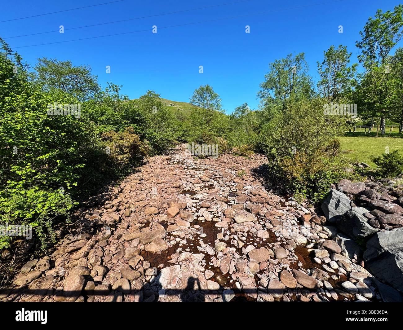Dry river bed (Nant Haffes) during dry spell in May 2025, Wales - Smartphone Captured Stock Image
