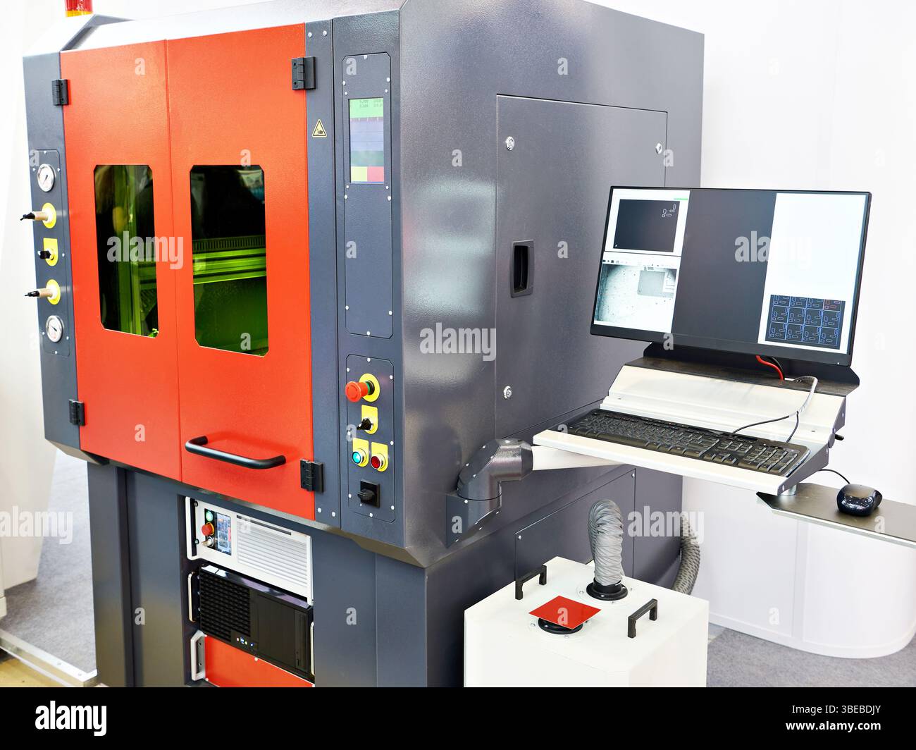 Laser cutting machine for precision with control panel laptop Stock Photo
