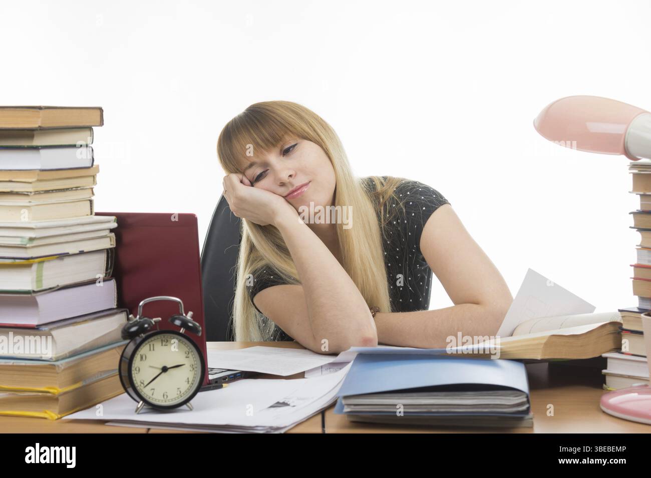 Student falls asleep looking at the screen Stock Photo