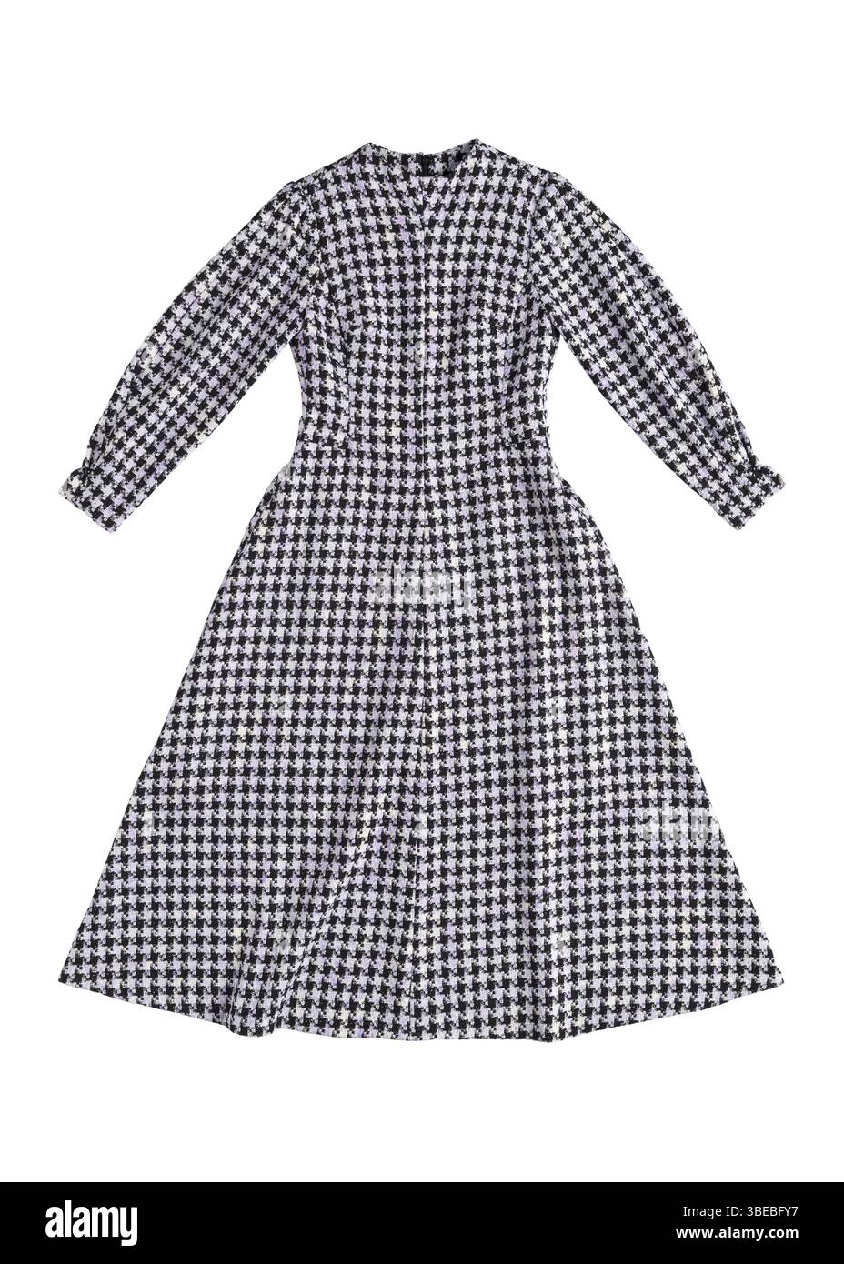 Warm women's dress with a checkerboard pattern on a white background Stock Photo