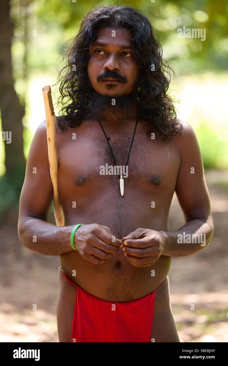 Vedda Language Vedda tribesman of Sri Lanka stands in natural surroundings ...