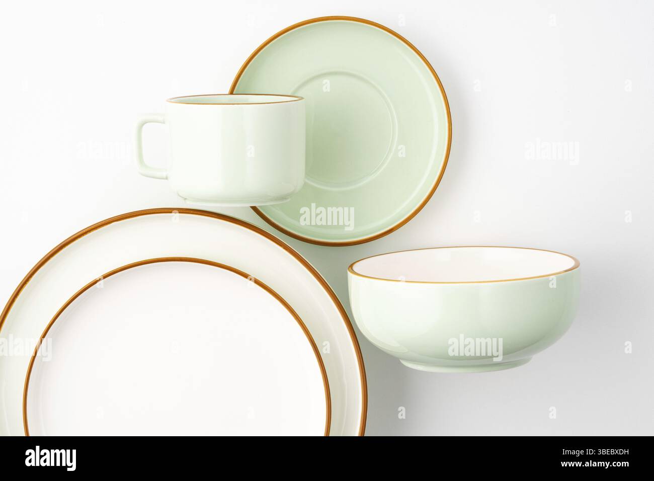 A set of ceramic tableware isolated on white background Stock Photo
